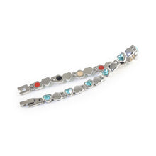 Beloved bracelet unclasped and folded to display alternating crystal and polished heart pattern.