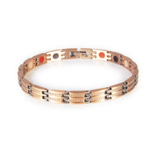 Canyon copper negative ion bracelet clasped front view, slim unisex design with etched bar pattern.