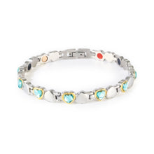 Cherish stainless steel and gold bracelet with blue Swarovski crystals clasped front view, heart-link design.