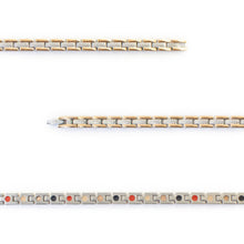 Close-up of Continuum negative ion bracelet links with stainless steel and rose gold to show detail.