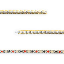 Close-up of Course negative ion bracelet links with stainless steel and gold to show detail.