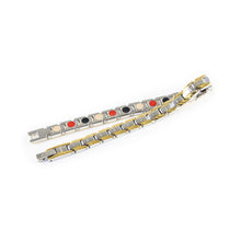 Course negative ion bracelet with stainless steel and gold, unclasped and folded for display.