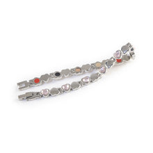 Devotion bracelet unclasped and folded to display alternating crystal and polished heart pattern.