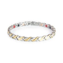 Duet bracelet in stainless steel and gold-plated dual-tone design with flowing wave-shaped links and embedded negative ion elements.