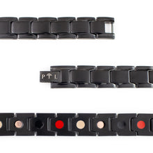 Close-up of Ebony bracelet highlighting matte black links and polished borders with embedded negative ion elements.