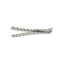 Elegant Flower bracelet unclasped and folded to display silver-toned polish and refined link detail.