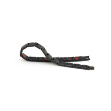 EverStrength black stainless steel bracelet unclasped, displaying embedded negative ion elements.