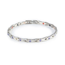Evermore titanium bracelet with purple crystals clasped front view.