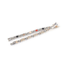 Flutter negative ion bracelet with stainless steel and rose gold, unclasped and folded for display.