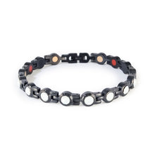Black stainless steel bracelet with white crystal accents in clasped front display.