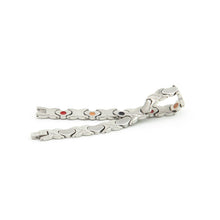 Love bracelet unclasped, displaying alternating heart and X links with embedded elements in each heart.