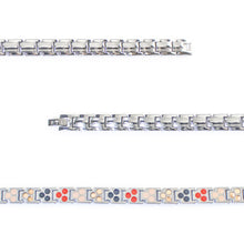 Close-up of Lumina bracelet showing beveled links and triple negative ion elements.