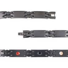 Close-up of Millennial bracelet highlighting matte and polished black stainless steel links and negative ion elements.