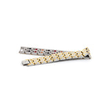 Mysterious Twist gold and stainless steel bracelet unclasped and folded to display two-tone pattern and sturdy link design.
