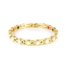 Opulent gold-plated stainless steel bracelet with white crystals clasped front view.