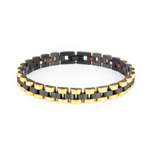 Perfect Balance black and gold stainless steel bracelet front view showing matte black center links and polished gold borders.