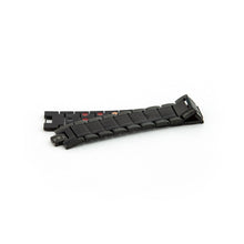 Precious Black titanium bracelet unclasped and folded for display, revealing triple rows of embedded negative ion elements within each link.