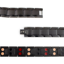 Close-up of Pure Black bracelet highlighting matte black finish, polished edges, and dual embedded negative ion elements.
