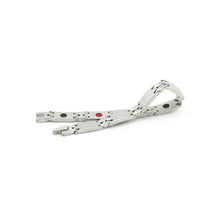 Reflection stainless steel bracelet unclasped and folded to display interlocking matte and polished links with embedded elements.