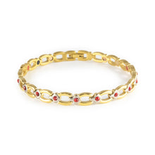 Scarlet gold-plated titanium bracelet with red crystal accents clasped front view.