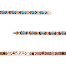 Close-up of Sierra copper bracelet links with turquoise to show detail.