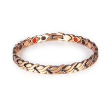 Sundance copper negative ion bracelet with wave-shaped links, front clasped view.