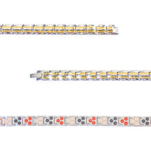 Close-up of Twin Glow bracelet showing gold stripe accents and embedded elements.