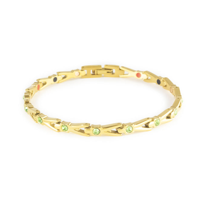 Vitalis gold-plated titanium bracelet with green crystals clasped front view.