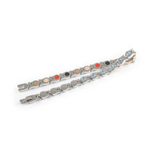 Whisper bracelet unclasped and folded to display link and crystal design.